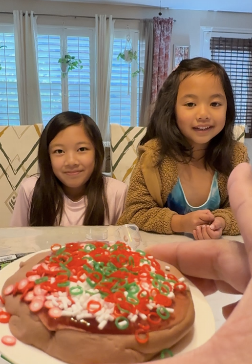 Girls showing the slime recipes